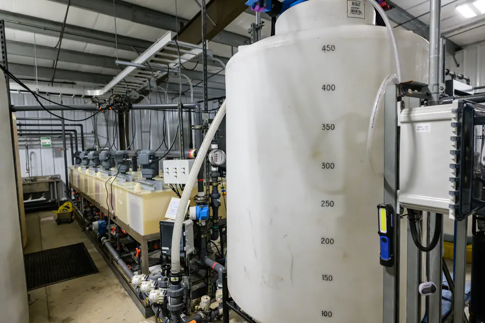 A large liquid storage tank inside the A34 facility.