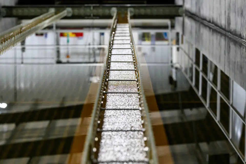 Water traveling through a conveyor belt at the AMD A34 facility.